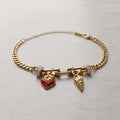 Golden Charm Bracelet with Strawberry & Seashell Pendants